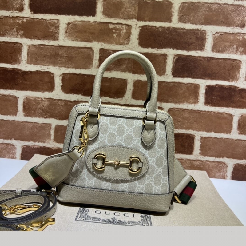 G*u*i top handle bags